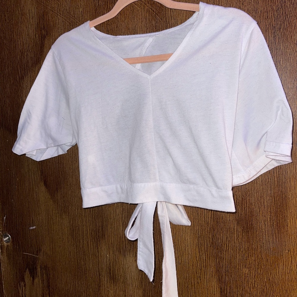 White cropped top, open tied back